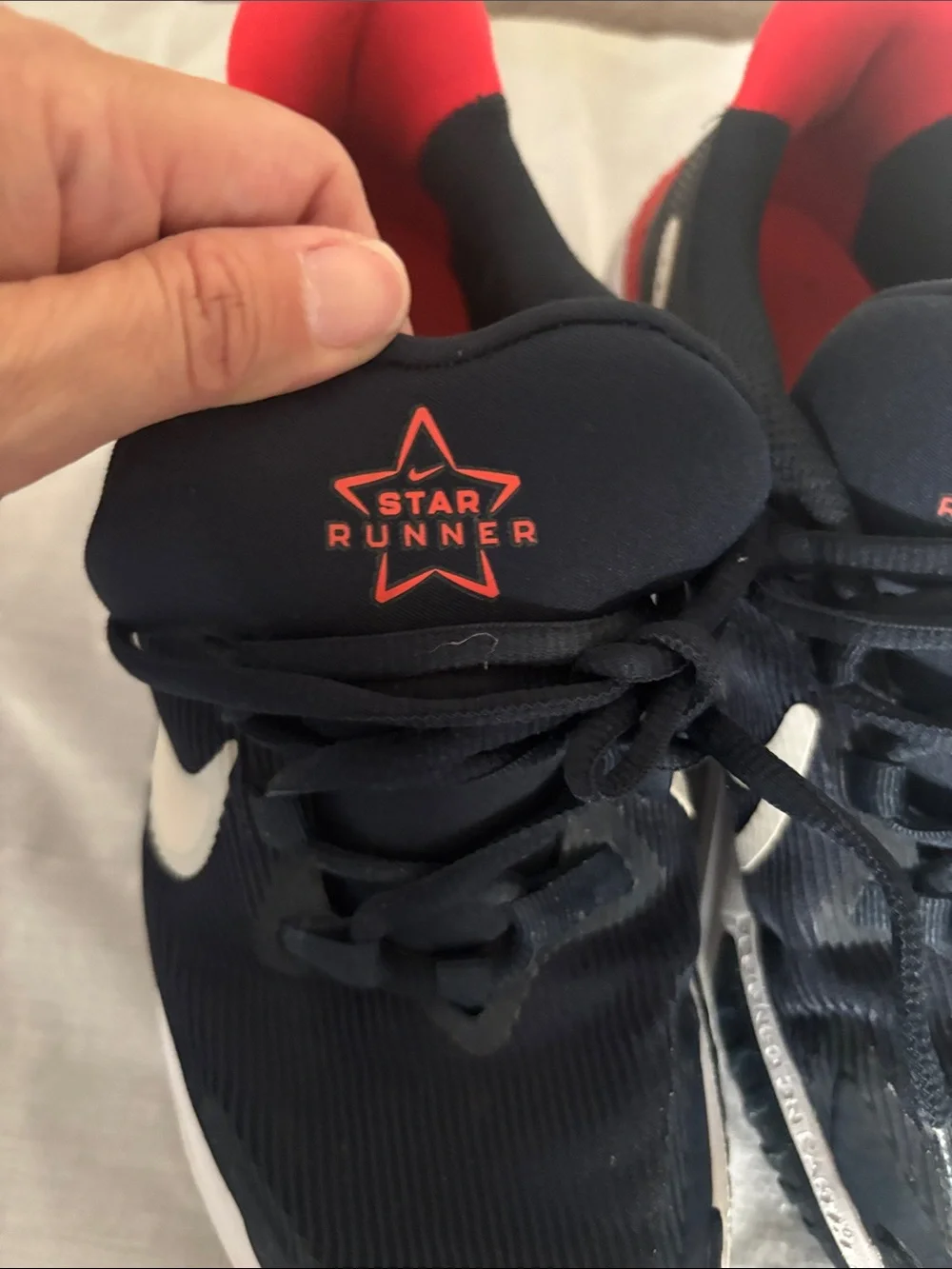 Nike Boys Sneakers in Black with White Swoosh and Red Accent